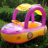 Inflatable children's pool with purple and yellow colors on grass