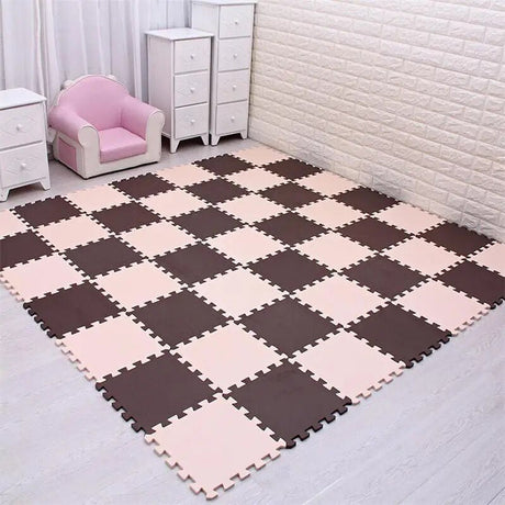 Checkered foam mat on a floor with white walls and furniture.