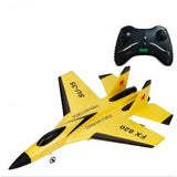 Yellow and black toy airplane with remote control on a white background