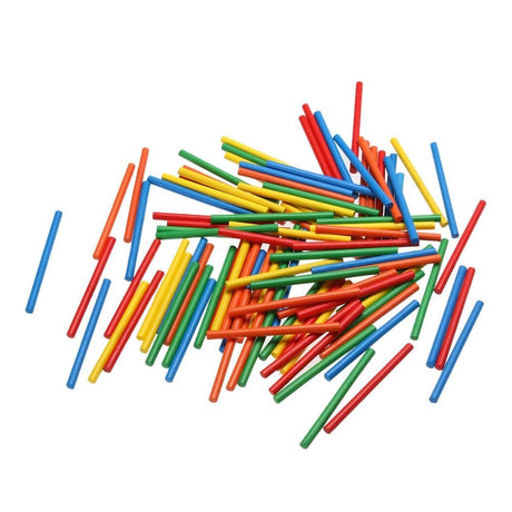 Colorful wooden sticks in red, blue, yellow, and green on a white background