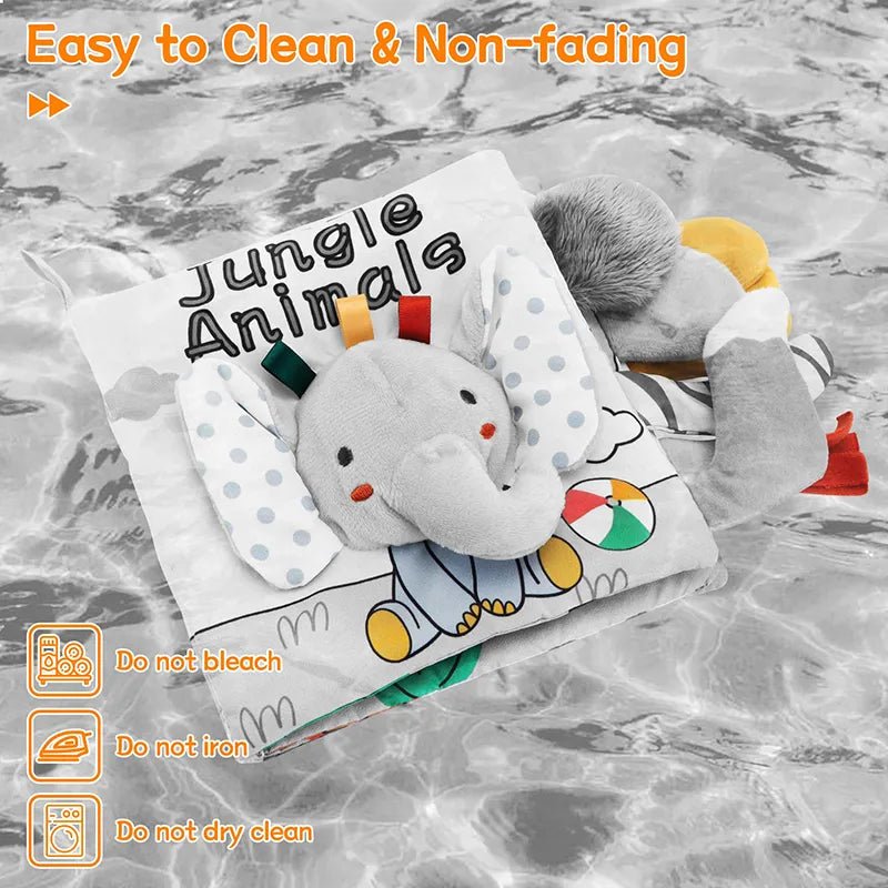 Plush elephant toy with a 'Jungle Animals' pillow on a marble background, featuring cleaning instructions.