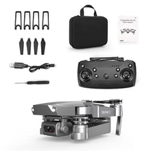 E68 foldable drone kit with carry case, USB cable, spare propellers, and tool for travel-ready flying sessions.