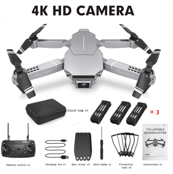 E68 mini drone with folded arms beside its accessories for compact storage in a backpack or car boot.