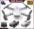 E88 Pro RC drone with 4K dual camera and accessories for aerial photography, outdoor flying, and kids gifting.
