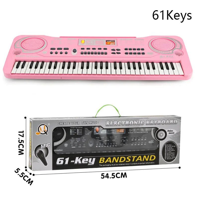 Pink electronic keyboard with dimensions and packaging details on a white background