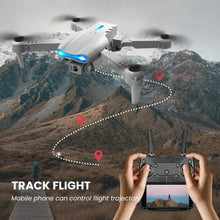 E99 K3 Pro drone flying over mountain terrain controlled by smartphone app for aerial photography.