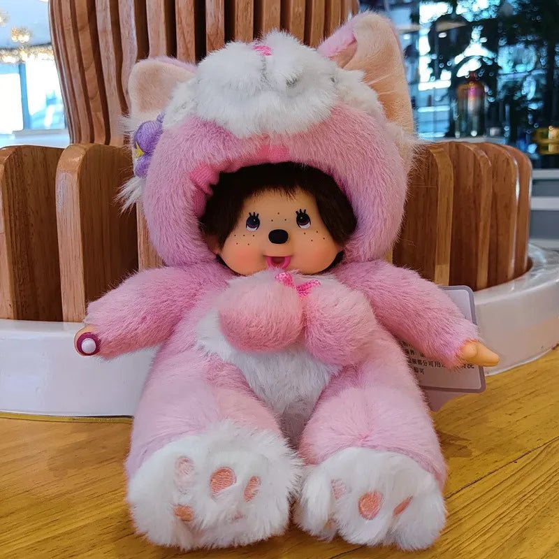 Plush toy in a pink outfit with white accents on a wooden floor.