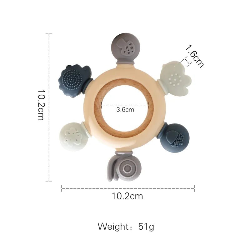 Baby teething ring with measurements.