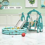 Children's play set with slide, swing, and ball pit on a light wooden floor.