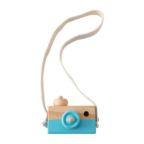 Wooden toy camera with a blue bottom and beige top on a white background