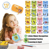 Child with educational flashcards on a table, featuring various objects and colors.