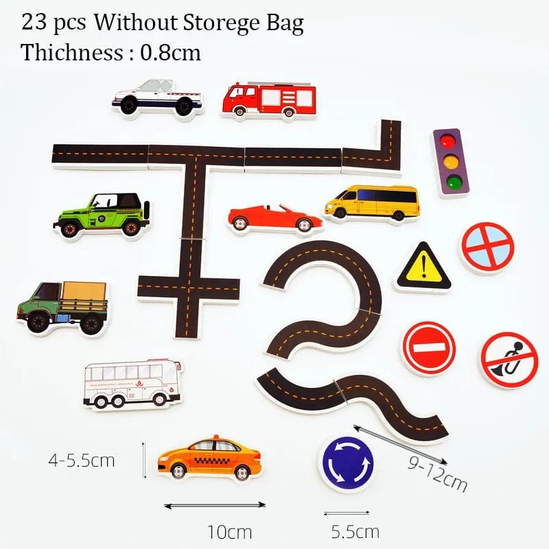 Toy road set with cars, traffic lights, and signs on a white background