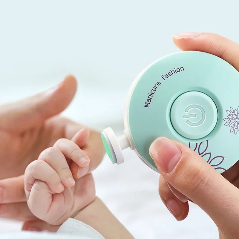Electric baby nail trimmer device for gentle newborn manicure and pedicure care.