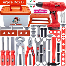 Set of toy tools and accessories with a red drill and various tools .