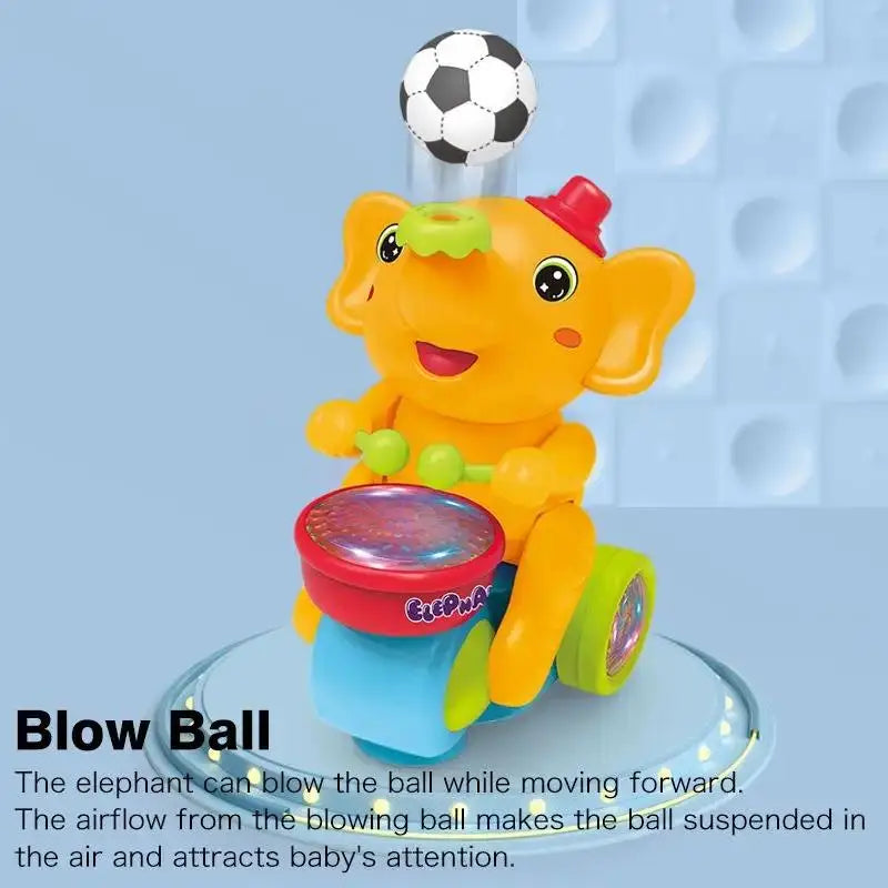 Yellow elephant drummer toy blowing a floating ball in the air