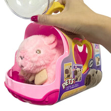 Hand holding a pink carrier case with a heart window and a pink capybara plush toy inside
