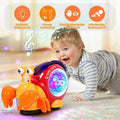 Electronic crawling crab glowing music toy used by a child for interactive floor play.