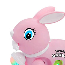 Electronic walking rabbit toy in pink with a large blue eye for engaging baby play.