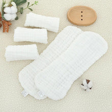 Set of Elinfant reusable cotton diaper inserts displayed for everyday cloth nappy changes.