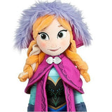 Plush toy of a character from Disney's 'Frozen' with purple hair and pink cape on a white background