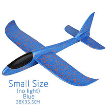 Blue speckled foam glider with text indicating size and color.