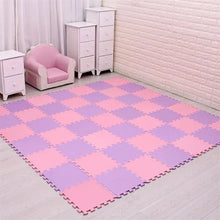 Checkered pink and purple mat on a light wooden floor with a pink chair and white drawers in the background.