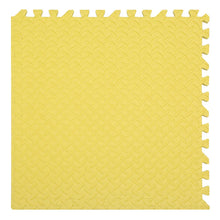 Yellow foam puzzle mat with interlocking edges.