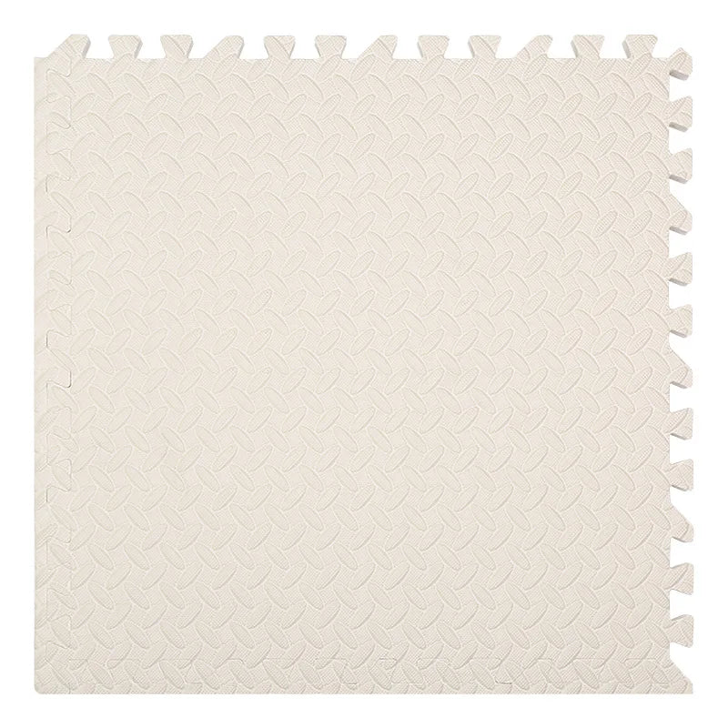 White textured rug with tassels.