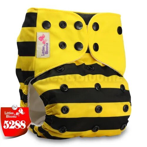 Yellow and black patterned diaper with 'Littles & Bloomz' branding 