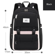 Everyday waterproof school backpack in black with brand label detail, built for daily student commutes and weekend use.