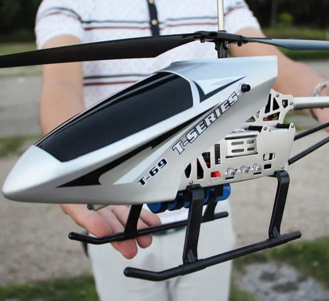 A model helicopter held by a person 