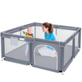 Mother and baby inside a grey mesh playpen