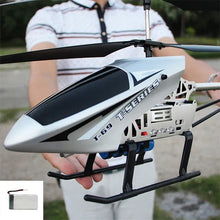 Extra Large 3.5CH RC Helicopter held in hand for a close-up detail view showing its size as a kids' gift drone.