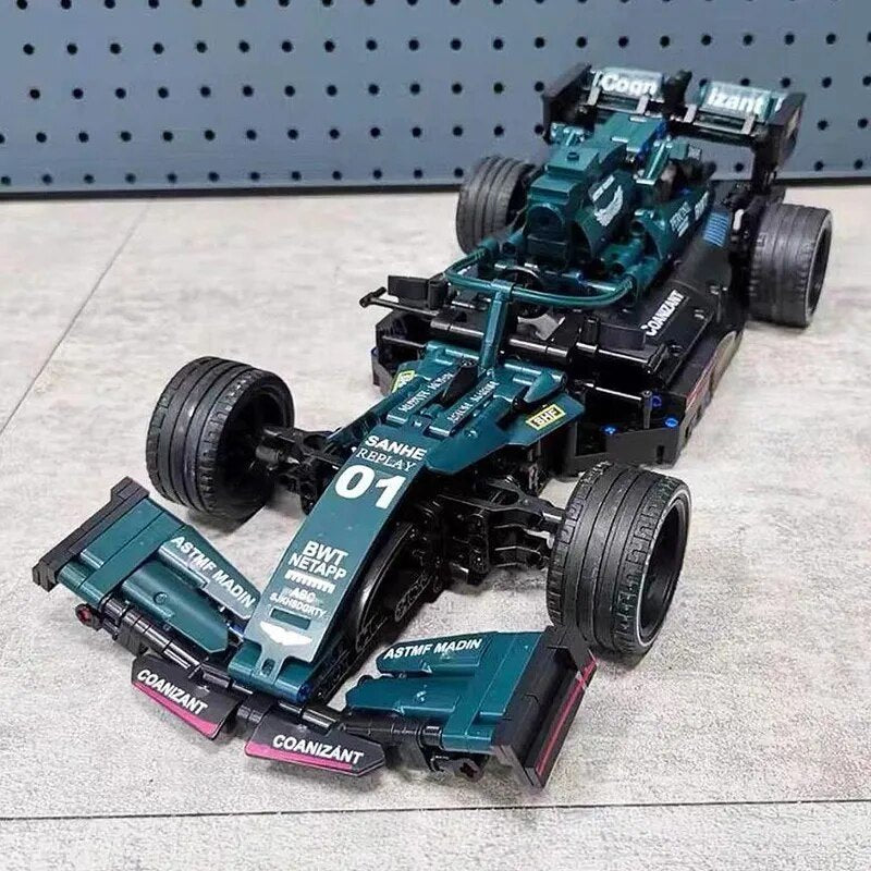 F1 Formula RC racing car building block model displayed on a gray surface for collectors and kids.