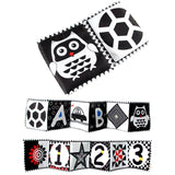 Educational fabric toys with owl, alphabet, and number designs on a white background