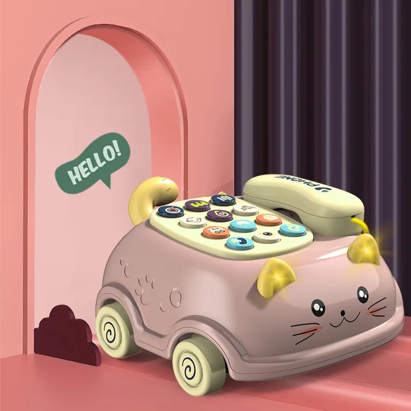 Toy phone shaped like a cat with a pink background and 'HELLO!' sign.