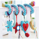 Colorful baby mobile with starfish, heart, and cloud shapes hanging from a crib.