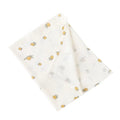 Folded fabric with pineapple pattern on a white background