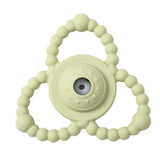 Light green teething ring with beads on a white background