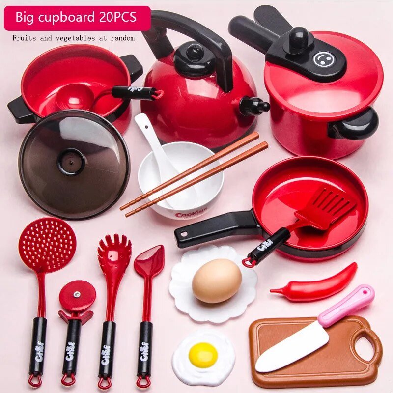 Set of red kitchen utensils and cookware on a pink background