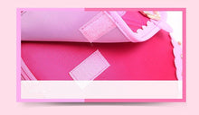 Close-up of a pink fabric with mesh and stitching details on a pink background