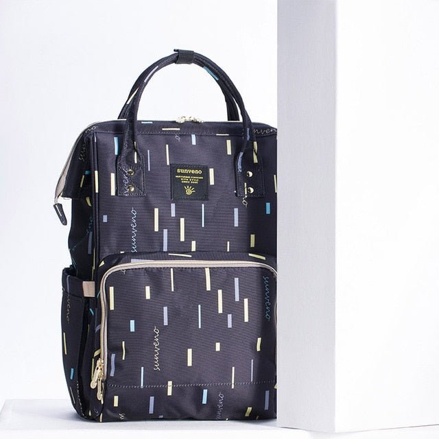 Black patterned backpack with visible brand logo.