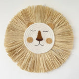 Round woven mat with a lion face design on a white background
