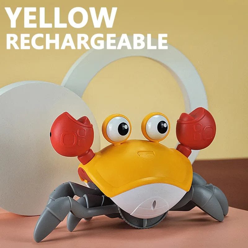 Yellow rechargeable toy crab with a neutral background