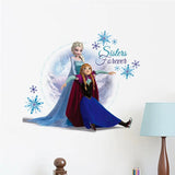 Wall decal of Elsa and Anna from Frozen with 'Sisters Forever' text on a white wall.