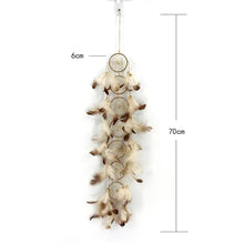 Feather rattan dream catcher shown with a dimensions chart for boho decor planning.