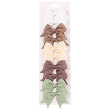 Five colour bow hair clips for coordinating everyday hairstyles and weekend outfits.