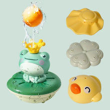 Floating and rotating frog bath toy set with shell and starfish accessories for bath time fun.