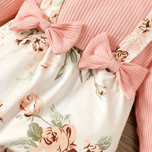 Floral trouser fabric and pink ribbed knit detail of the baby girl set for soft, breathable everyday wear.