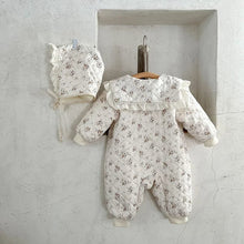 Floral winter romper with matching fur-lined hat, a two-piece toddler outfit for chilly mornings and outdoor playtime.